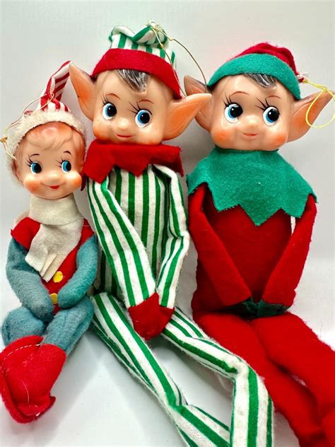 mr. christmas knee hugger|3 knee hugger elves.